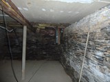 Masonry Repair Needed Limestone Basement Foundation Walls (Before Photo)